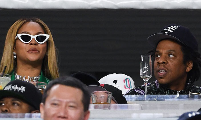 Beyonce and Jay-Z refused to stand for the national anthem at the Super Bowl LIV in Miami just days after the rapper described himself as "marching for the same cause" as Colin Kaepernick.