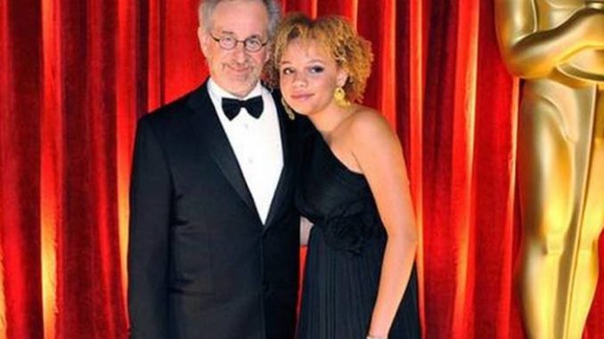 Steven Spielberg’s adopted daughter has launched a new career as an adult entertainer and says her father is "intrigued" with her choice.