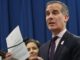 Los Angeles Mayor Eric Garcetti slams Trump and warns of at least two more months of lockdown