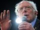 Sen. Bernie Sanders warns the political establishment is trying to derail his campaign and boost Joe Biden's