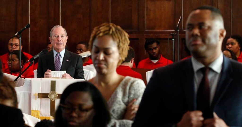 Attendees turn their backs on Michael Bloomberg during visit to black church in Alabama