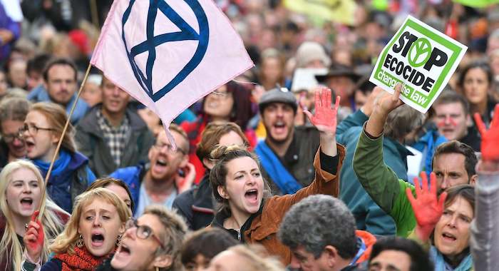 A climate change group that aligns itself with Extinction Rebellion, endorsed by Greta Thunberg, has launched an information warfare campaign, posting stickers claiming that coronavirus is a “cure” for the “disease” that is the human race.