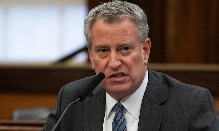 De Blasio warns people will of coronavirus because of President Trump