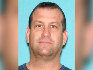 A New Jersey man has been arrested and charged with terror offenses after he was accused of coughing on a supermarket employee, according to authorities.