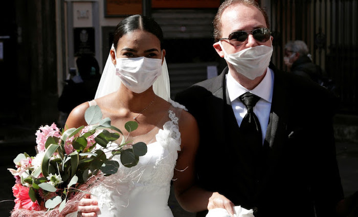 Italian minister warns hugs and kisses could be banned unless you're vaccinated