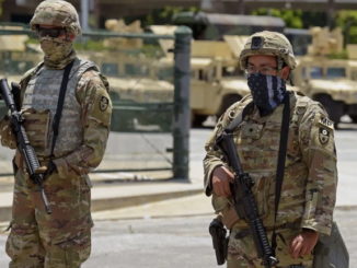 LAPD arrests rioter dressed at national guard and armed to the teeth
