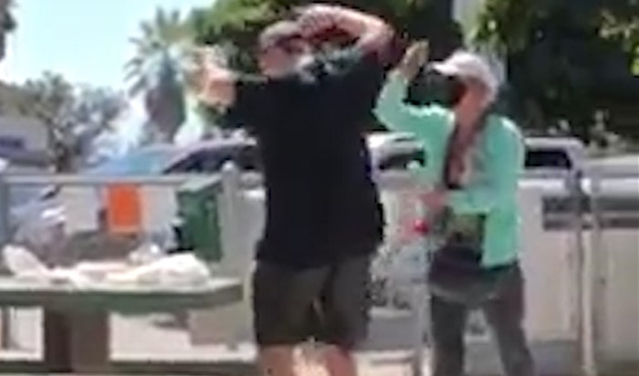 Woman maces couple for not wearing masks while eating lunch