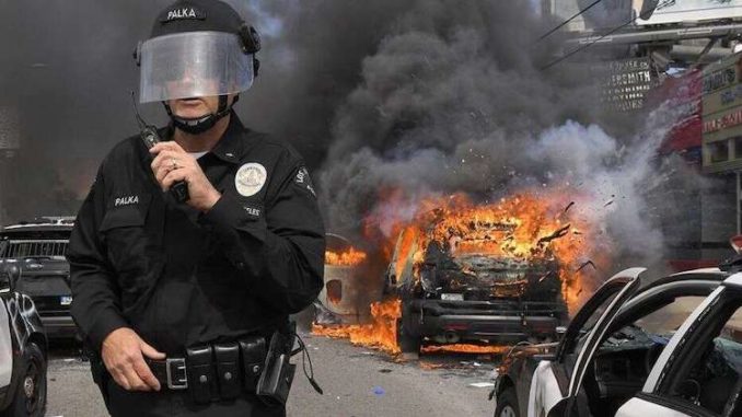 As American cities continue to deal with the ongoing attacks by violent leftists, dozens of anti-American corporations from around the world are collectively donating millions of dollars to far-left organizations that are working to defund American police departments, according to a new report.