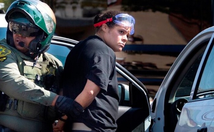 BLM activist who ploughed car through Trump supporters is arrested and charged with attempted murder