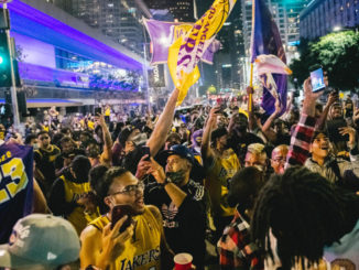 LAPD car attacked by maskless Lakers fans outside Staples Center