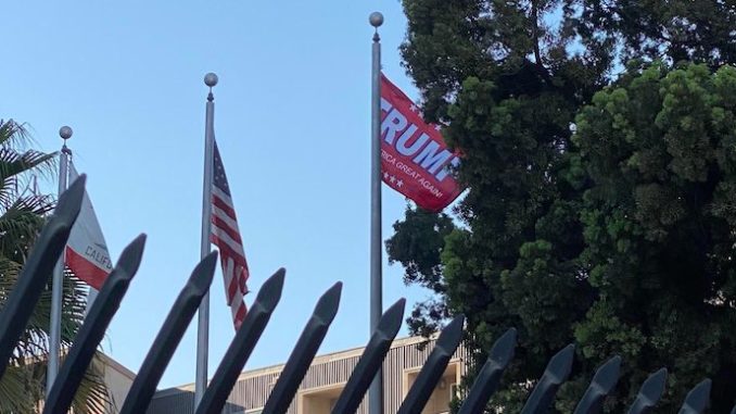 Patriots take down California flag and replace it with Trump campaign banner