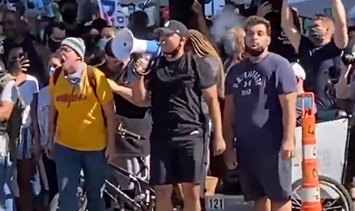 Biden supporters chant 'fuck fascist USA' to Trump crowd