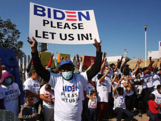 Illegals wearing Biden t shirts flood border begging to be let in