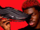 Rapper unveils Nike satan shoes filled with real human blood