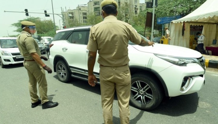 Indian police caught hammering nails into hands and feet of citizens who refuse to wear masks