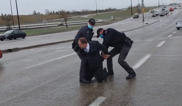 Canadian priest arrested for holding church service