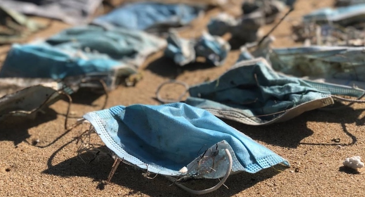 WHO says vaccinated people must continue to wear masks