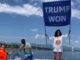 Osama bin Laden's niece unveils 'Trump won' banner outside Biden-Putin summit