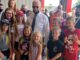 Biden trolled by MAGA kids during photo