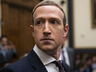 Crowd chants 'lock him up' at Mark Zuckerberg
