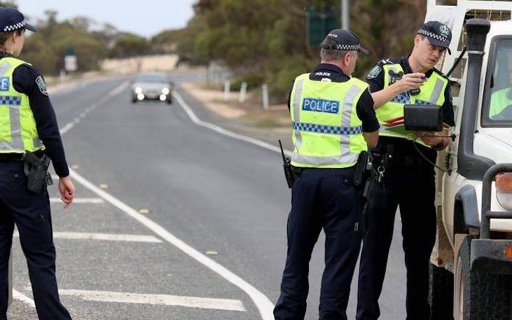 Women in Australia in quarantine camp confronted by police for drinking tea without a mask