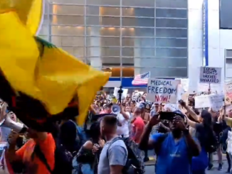 Protestors demonstrate against vaccine mandate outside New York Times HQ