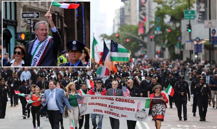 Bill De Blasio trembles with fear as crowd chant 'f**k you' at him