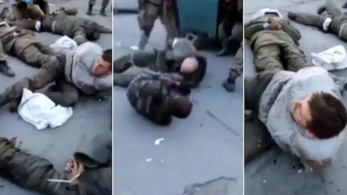 Ukrainians caught committing war crimes by shooting and torturing Russians on camera - media blackout