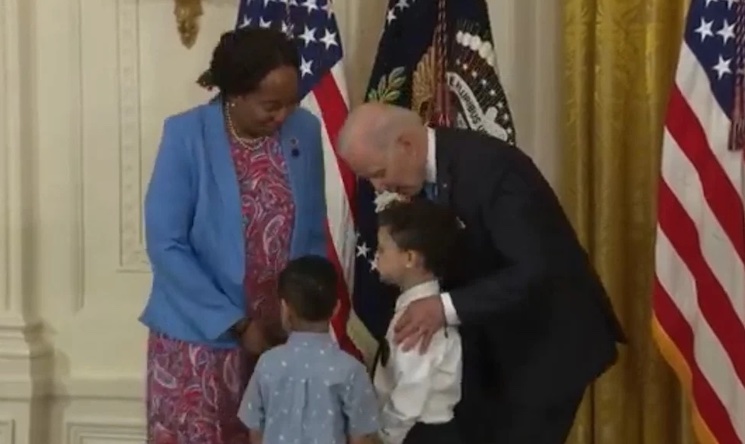 President Joe Biden caught on camera groping a little boy