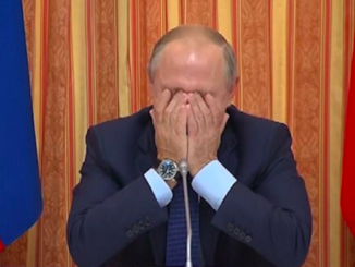 Putin laughing
