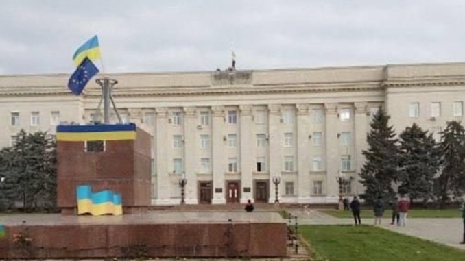 Ukrainians fly EU flag to celebrate Russian retreat