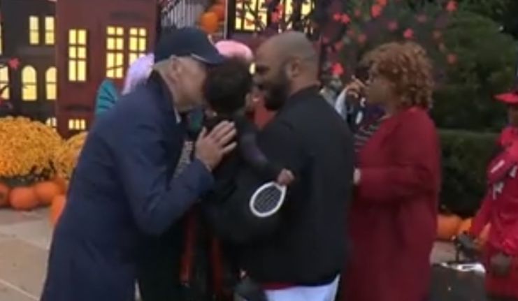 Joe Biden creeps on another child during Halloween celebrations