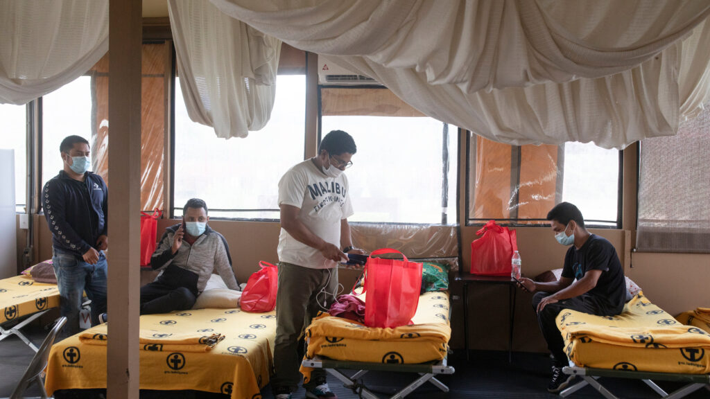 migrants in homeless shelters