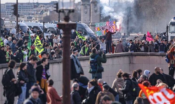 French citizens are rising up against the New World Order as fiery riots erupted in Paris on Thursday in response to President Emmanuel Macron's move to raise the retirement age from 62 to 64 without a vote.