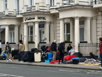 Migrants protest hotel conditions