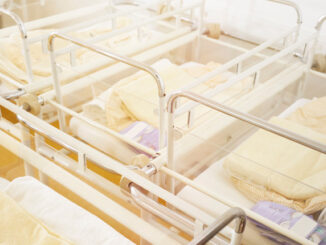 British government say declining birth rates will help save the planet