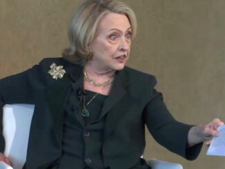 Hillary Clinton trembles with fear as crowd call her 'warmonger' to her face