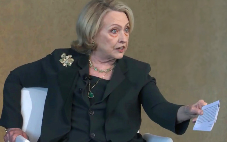 Hillary Clinton trembles with fear as crowd call her 'warmonger' to her face