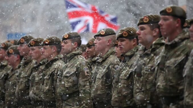 British WEF leader deploys 20,000 military troops to Russian border.