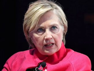 Hillary Clinton trembles with fear as crowd chant 'war criminal' to her face