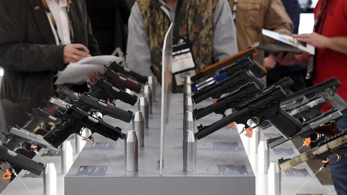 Visa, Mastercard, American Express to track gun sales in America and report them to Feds.