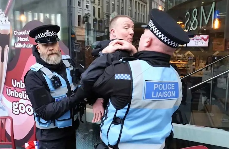 UK police arresting citizens who display British flags in public
