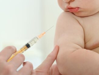 Baby having vaccine