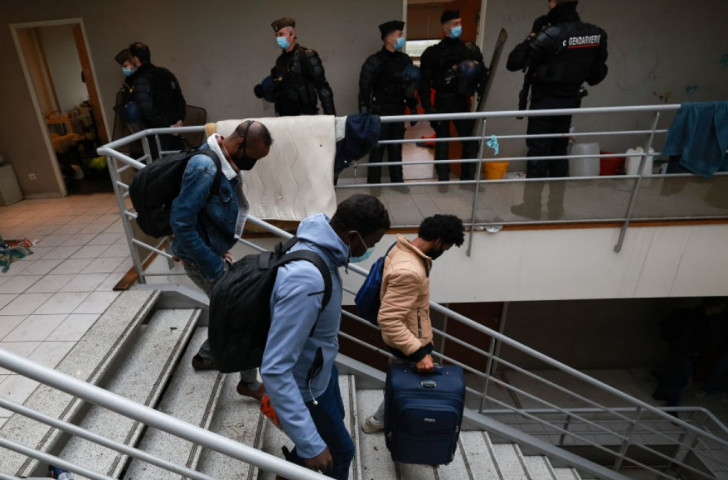 migrants evicted from squat