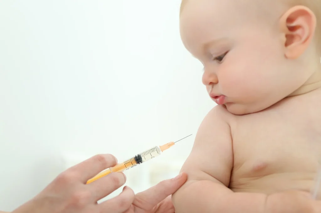 child having vaccination