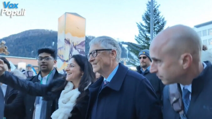 Billionaire eugenicist Bill Gates was left visibly shaken up during a visit to the World Economic Forum's annual meeting on Tuesday, where he was confronted by an angry crowd. 